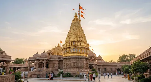 Majestic golden spire shikhara of the Shri Gajanan Maharaj Samadhi Mandir in Shegaon